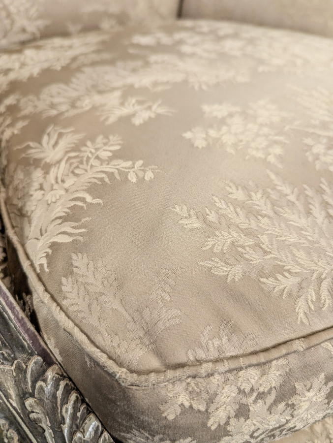 Paire de Bergères réchampies de style Louis XVI