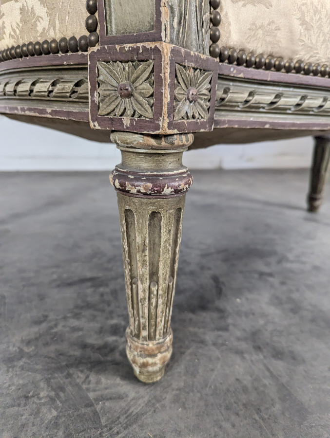 Paire de Bergères réchampies de style Louis XVI