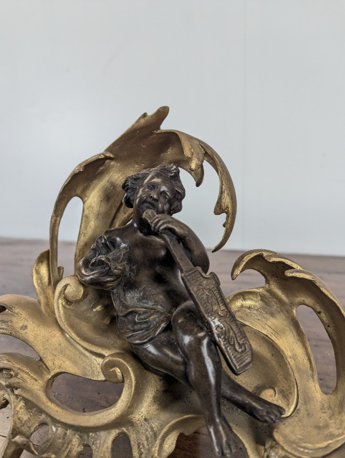 Paire de chenets en bronze de style Louis XV