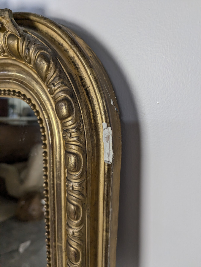 Miroir doré époque Napoléon III à coquilles et godrons