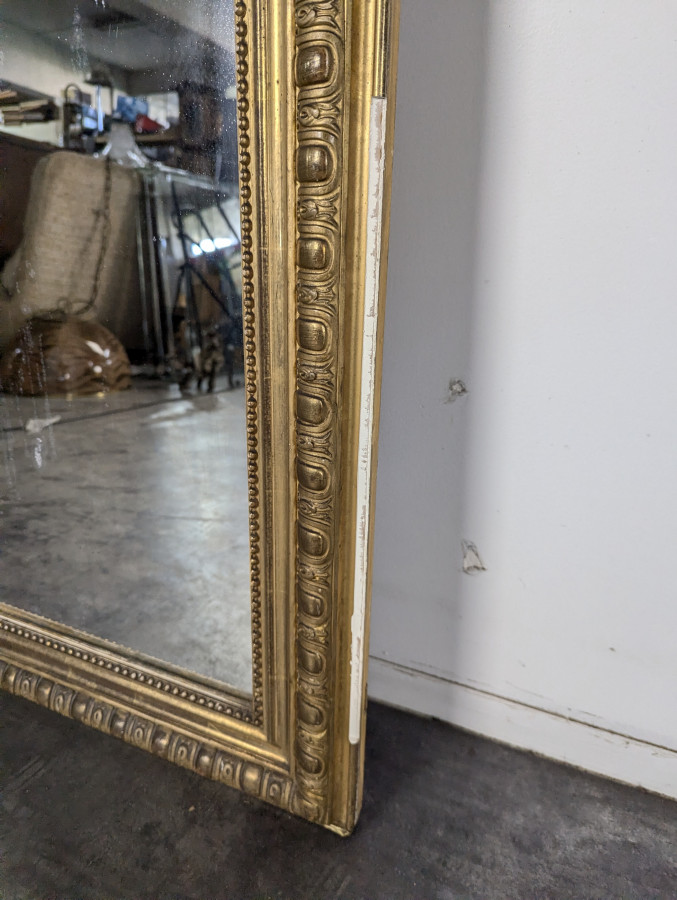 Miroir doré époque Napoléon III à coquilles et godrons