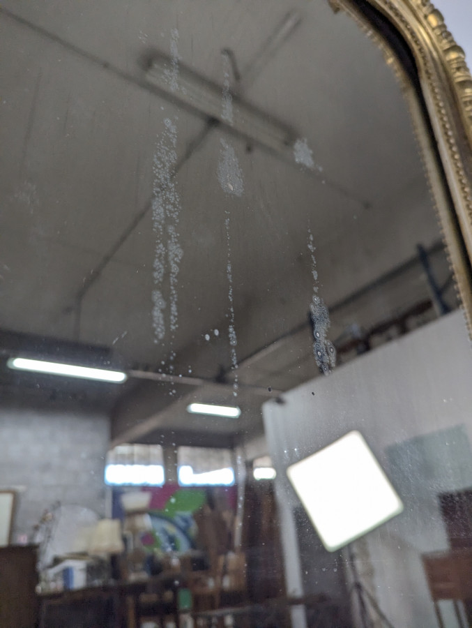 Miroir doré époque Napoléon III à coquilles et godrons