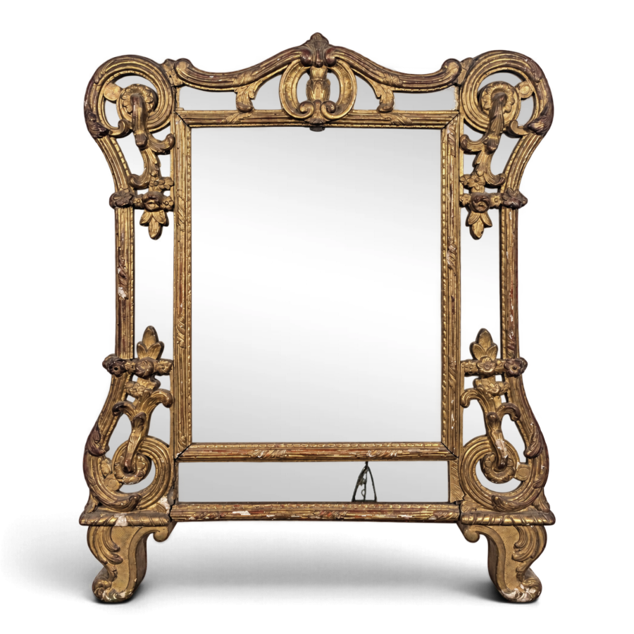 Miroir à parcloses de style Régence en bois doré sculpté