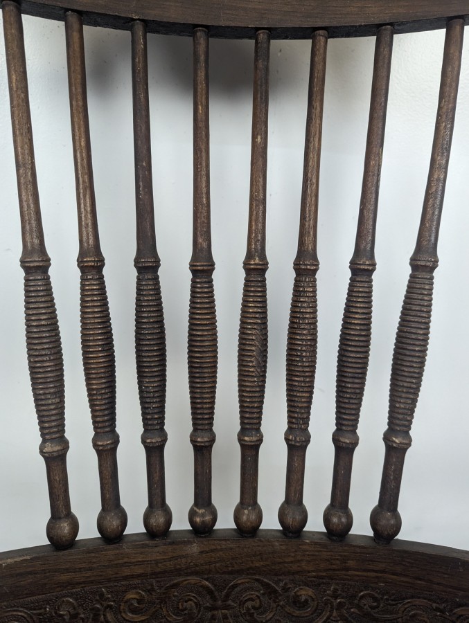Fauteuil américain à barreaux et assise cannée