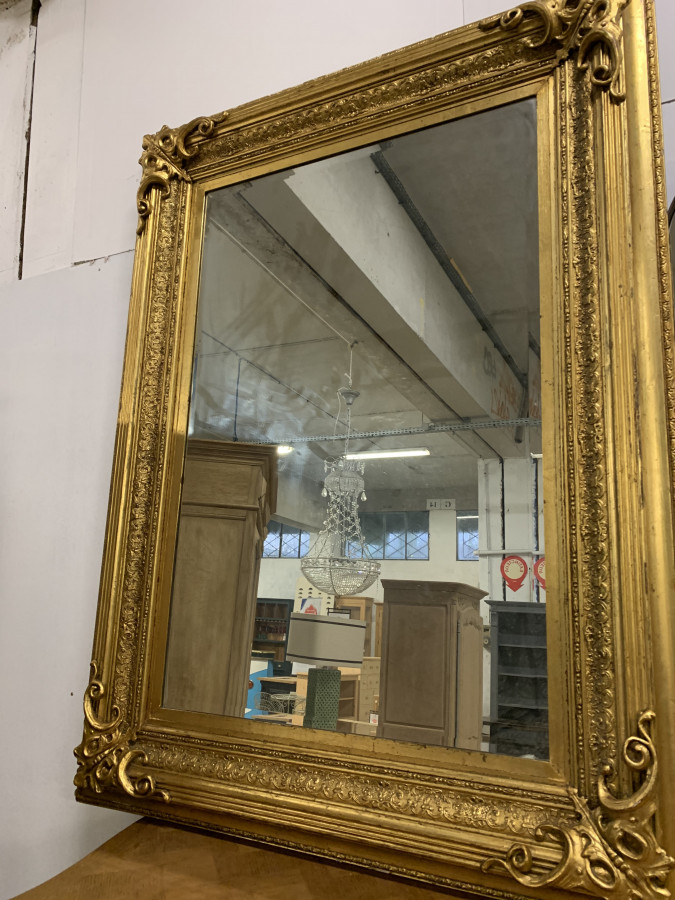 Impressionnant miroir en bois doré