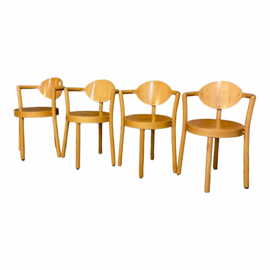 Série de 4 fauteuils en hêtre de la maison Baumann