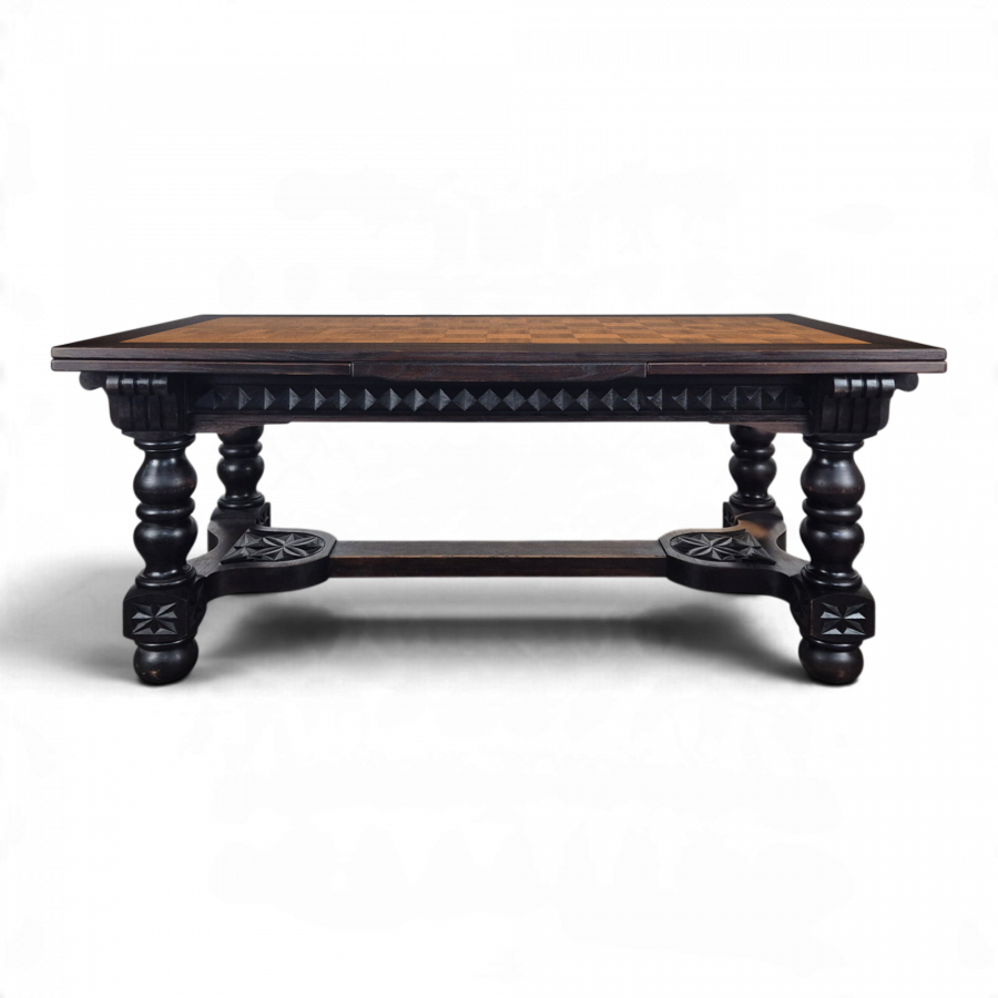Table bretonne à allonges en chêne sculpté plateau parqueté